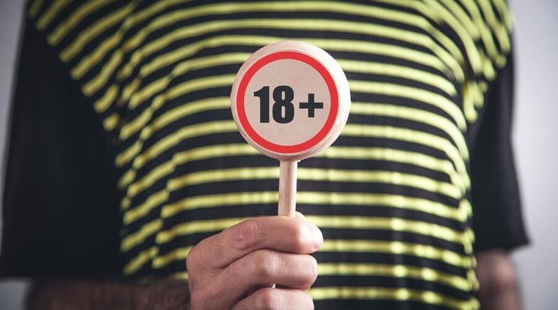 Файл:Man-showing-18-adult-symbol 220873-10328.jpg